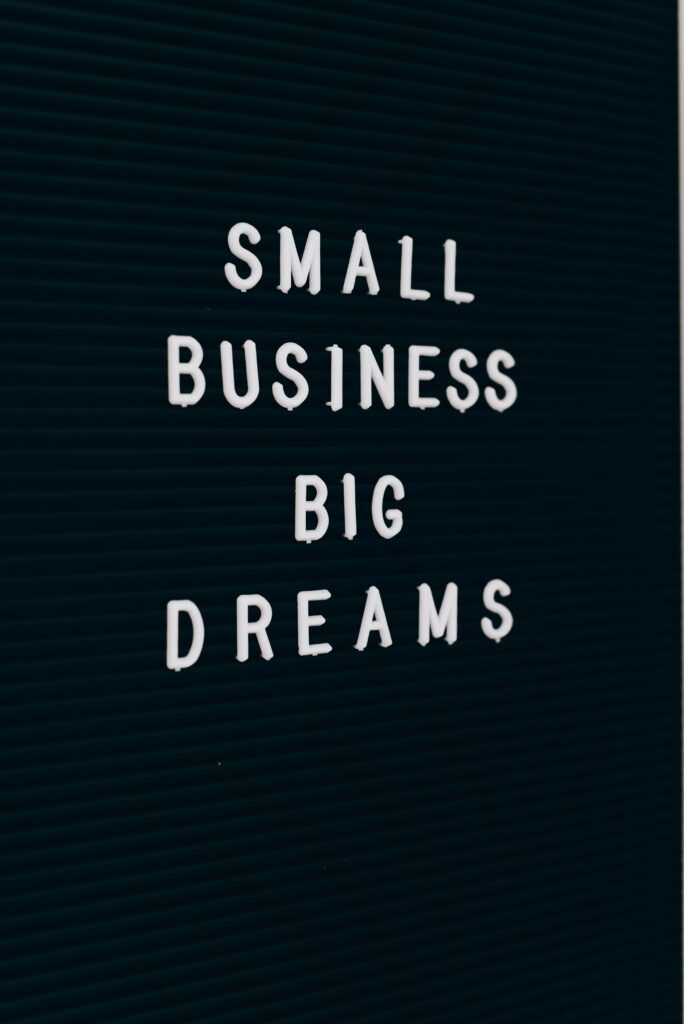 Close-up of a motivational quote about small business dreams on a letter board.
